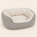 Couchage enveloppant pour chien Våg coloris gris clair